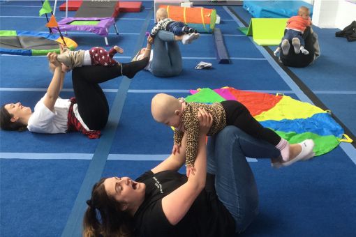 Parents enjoying time with thier babies at a Gym Babies session